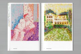 Spreads of an art publication on a grey background