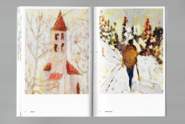 Spreads of an art publication on a grey background