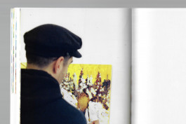 Spreads of an art publication on a grey background