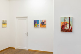 Photography of an art exhibition featuring paintings of artist Timur Lukas.