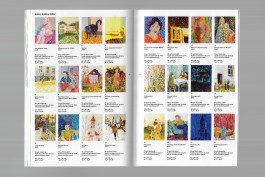 Spreads of an art publication on a grey background