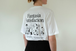 photography of a woman wearing a white shirt with a black print on the back 