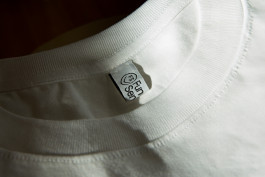 photography of a white shirt with a woven label 