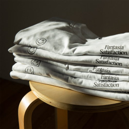 photography of a white shirt with a black print on it 