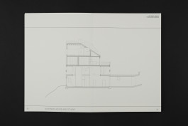 spread of an architecture portfolio book on a black background