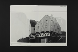 spread of an architecture portfolio book on a black background