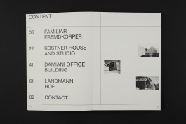 spread of an architecture portfolio book on a black background