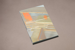 photography of a publication lying on a brown background