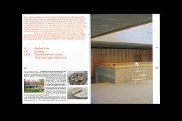 spreads of a publication lying on a black background