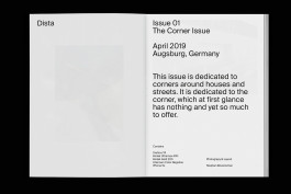 spreads of a photo zine lying on a black background