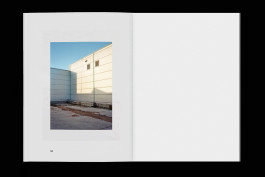 spreads of a photo zine lying on a black background