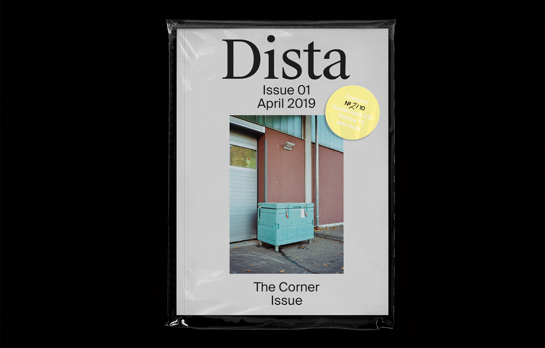 spreads of a photo zine lying on a black background