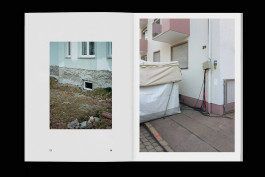 spreads of a photo zine lying on a black background