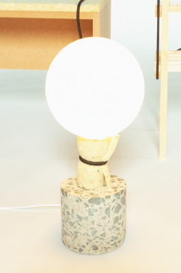 photography of a lamp standing in front of a neutral background