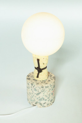 photography of a lamp standing in front of a neutral background
