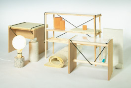 photography of several pieces of furniture standing together in front of a neutral background 